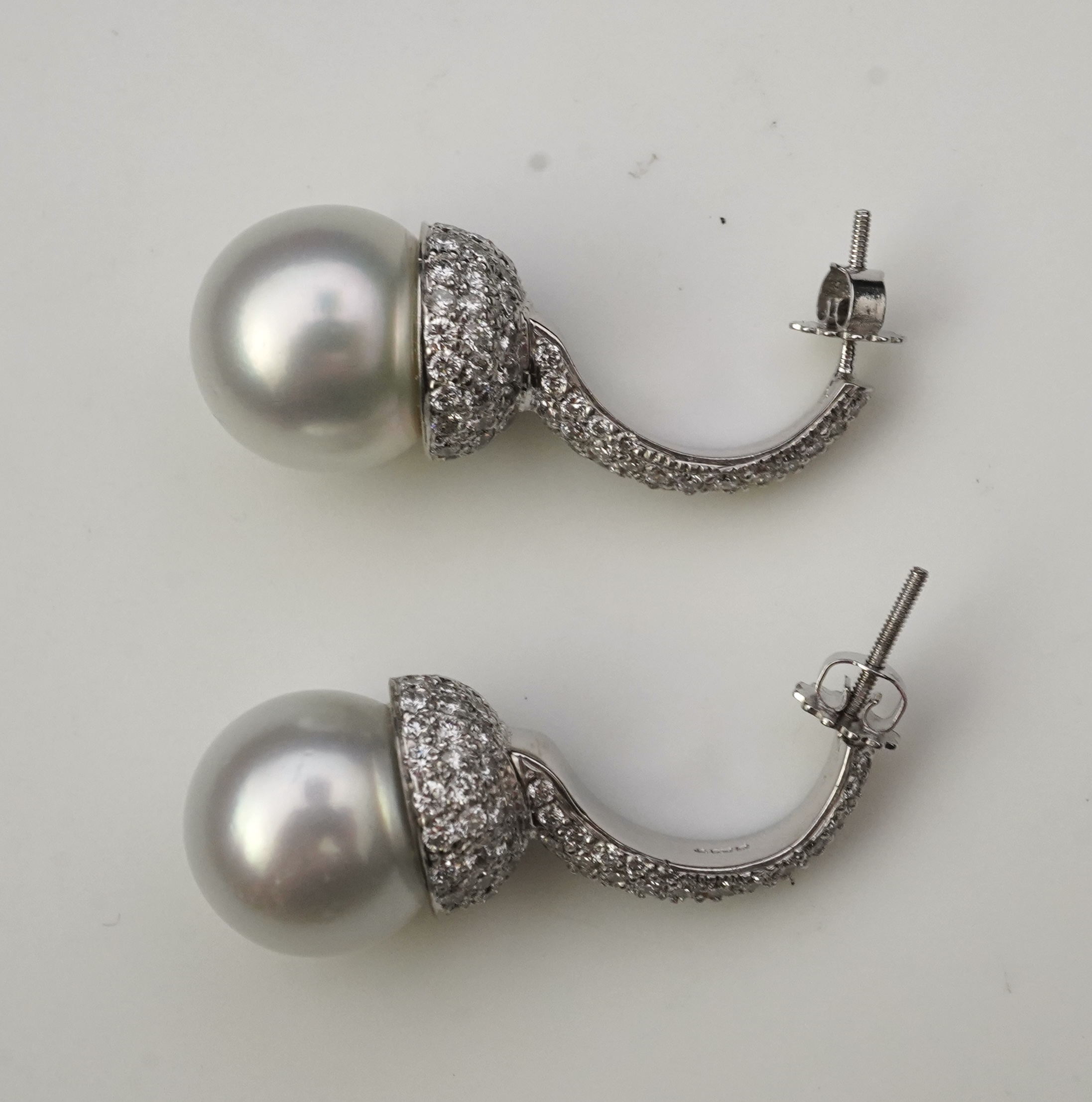 A pair of South Sea cultured pearl and diamond earrings